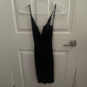 Black low cut mini dress size small